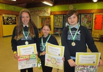 Pupils take part in a drawing competition to promote road safety