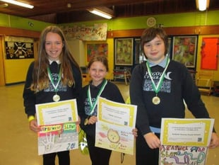 Pupils take part in a drawing competition to promote road safety