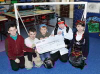 School receives donation from community fund