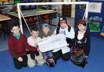 School receives donation from community fund