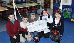 School receives donation from community fund
