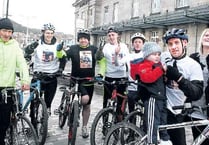 Cyclists arrive in Aber after gruelling charity ride