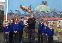 Schoolchildren present cheque to local lifeboat crew