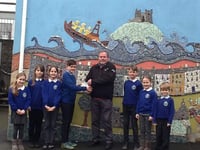Schoolchildren present cheque to local lifeboat crew