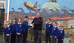 Schoolchildren present cheque to local lifeboat crew