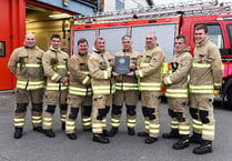 Fireman honoured with plaque for 41 years’ service