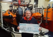 Campsite owner donates £250 to RNLI