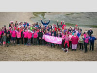 Coast path walkers raise £16,000 for cancer unit
