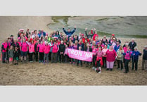 Coast path walkers raise £16,000 for cancer unit