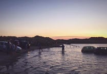 Beachgoers warned after 14 cars submerged by tide
