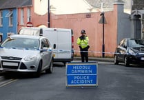 Two men charged over street attack on Aberystwyth student