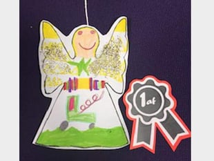 Aaron’s colourful angel wins first prize