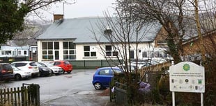 Teaching assistant put her fingers into pupil's mouth