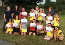 Brownies’ commitment to Welsh language commended
