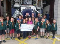 Cubs donate sponsored walk proceeds to lifeboat station