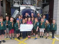 Cubs donate sponsored walk proceeds to lifeboat station