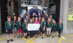 Cubs donate sponsored walk proceeds to lifeboat station