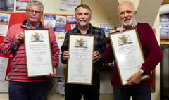 Long-service contribution of RNLI volunteers celebrated at boathouse