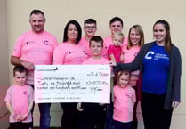 Postman delivers £26,000 to charity