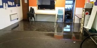 Scouts call for help after storm waters flood hall