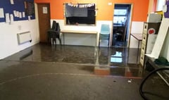 Scouts call for help after storm waters flood hall