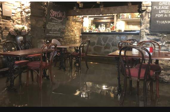 Aberystwyth restaurant forced to delay reopening after flash flood
