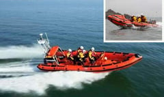'Excellent teamwork' to rescue two men after yacht capsized