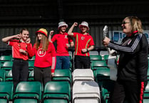 Mike Peters and members of the Red Wall sing Cymru's Euro 2020 song at Park Avenue