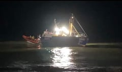 Fishing vessel runs aground at harbour mouth