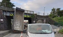 'Massive disruption' to travel routes after lorry hits railway bridge
