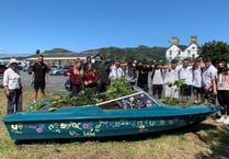 Students lend their hands to extend edible corridor