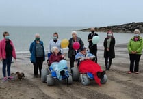 New beach wheelchairs hit the sand for first time