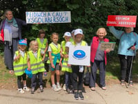 Claps and cheers for 'save our school' march