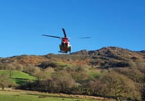 Helicopter called to rescue man stuck on mountain
