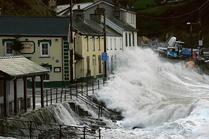 The Pentre Arms in Llangrannog takes a beating from storm waves on Friday

Picture: Ben Dearnley