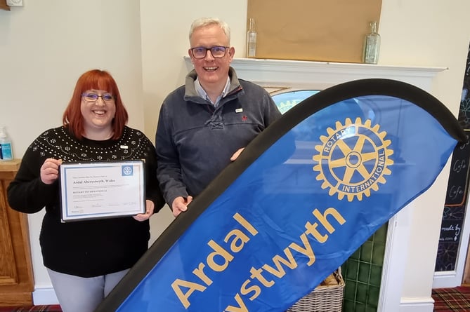 President Kerry Ferguson and executive secretary Richard Griffiths celebrated the news at their first Ardal Aberystwyth Rotary Club meeting as a recognised Rotary Club