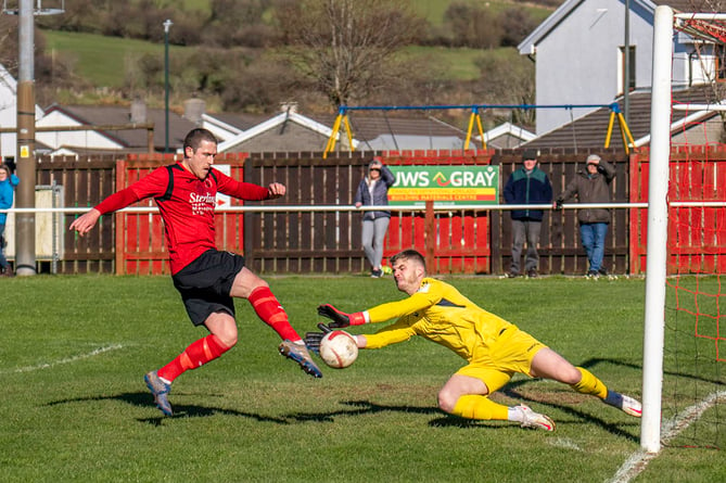 Josh Shaw scoring his first of his two goals for Penrhyncoch against Guilsfield in the JD Cymru North on 5 March, 2022