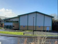Planning permission for sports hall granted despite local concerns