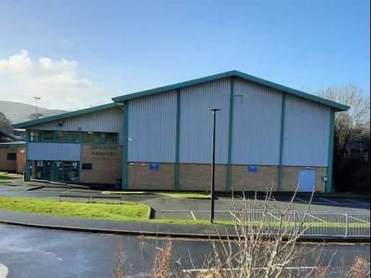 The transformation of Lampeter sports hall into a well-being centre has been granted planning permission despite local concerns about the impact on existing sporting groups.