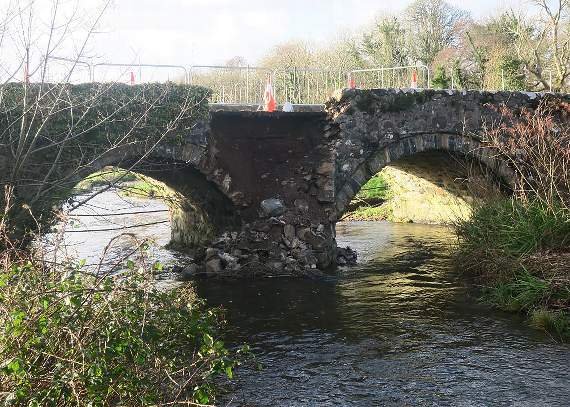 The A497 at Pont Bodfal has been closed after part of the bridge collapsed following a collision. The A497 is the main route for the people living on the north side of the Llyn Peninsula