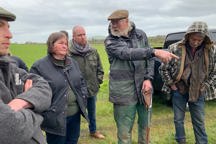 Natural Resources Wales chief executive, Clare Pillman, MS Mabon ap Gwynfor and members of the Meirionnydd branch of the FUW