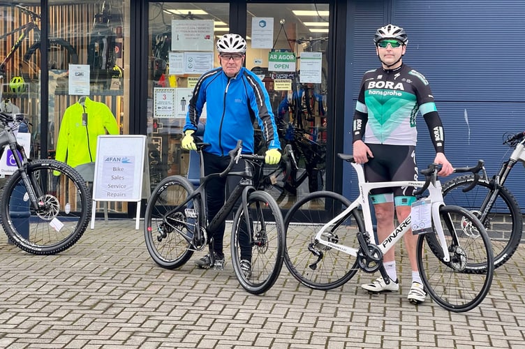 Cyclists Jon Burr and Stuart Hickman work at the shop and will be taking part on the day Afan 