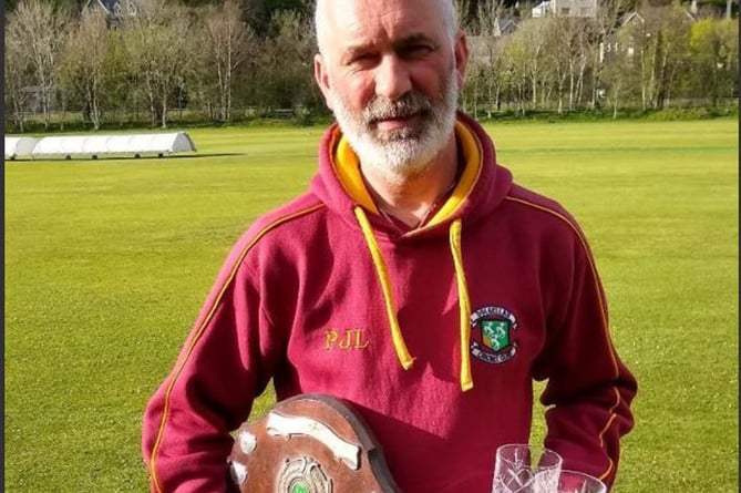 Phil Leeds, pictured here with Dolgellau’s Clubman Award, featured for Wales Over 50s on Sunday