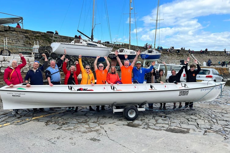 Members of Rhwyfo Sion Cwilt Rowing Club at the launch of Gwyntoedd Teg