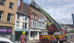 Aberystwyth road reopened as seagull is rescued from roof