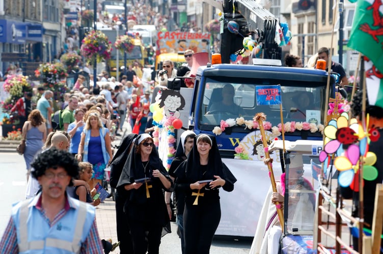 Photo Code DPJ31J160 Photo Arwyn Parry Jones 31July14 Ref Simon; Aberystwyth Carnival, last Saturday, - Carnival procession along Great Darkgate Street and North Parade.