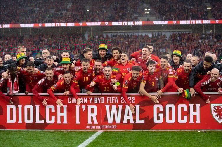 CARDIFF, WALES - 05 JUNE 2022: Wales celebrate at full time during the 2022 FIFA World Cup play-off final between Wales & Ukraine at the Cardiff City Stadium on the 5th of June 2022. (Pic by Ashley Crowden/FAW)