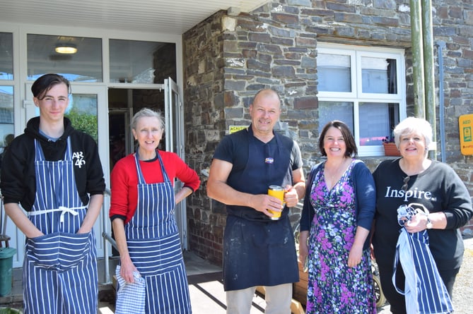 The team at Borth Community Hub are dedicated to supporting the entire community. Left to right: Dylan Taylor (community cafe assistant and youth worker), Martine Ormerod (runs the Dementia Friendly group and Caring Communities coordinator), Ian Luff (community cafe leader), Helen Williams (manager), and Lisa Francis (admin). 