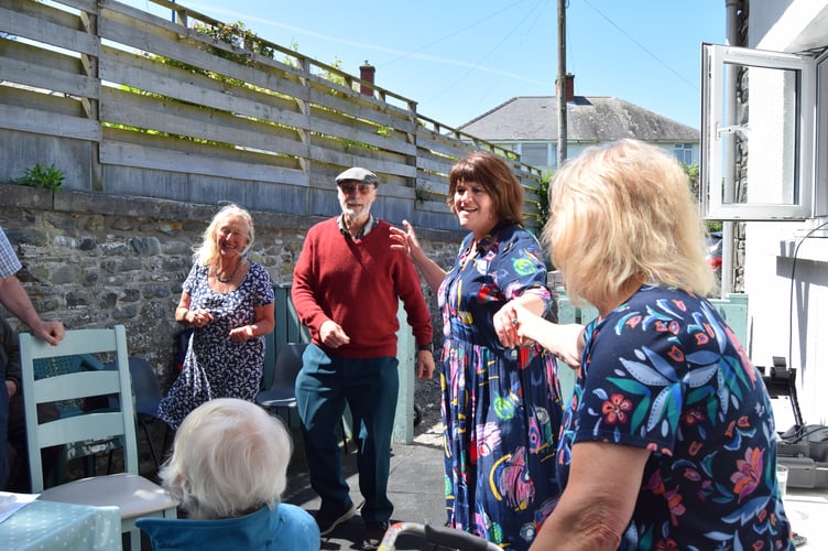Rae Cashman sing along at the Borth Community hub jubilee event