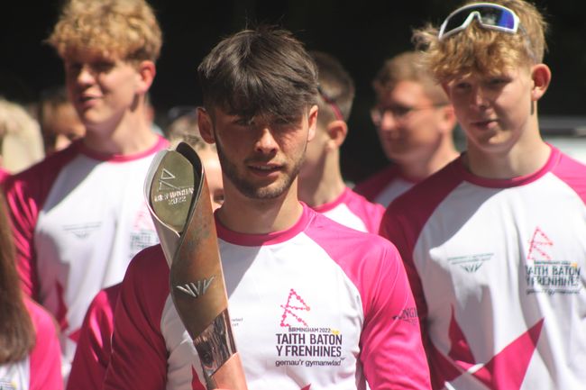 Cameroln Allen with the Commonwealth Games baton